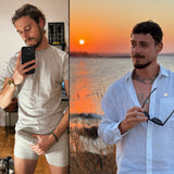 Man in gray T-shirt and underwear holds smartphone selfie indoors, another poses by sunset lake in white shirt holding sunglasses.