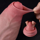 Close-up of pink Turtleneck Uncut Dildo foreskin stretched by fingers.