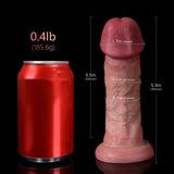 A red soda can is shown next to a flesh-colored dildo with measurement labels.