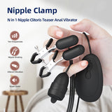 Hand holding nipple clamp and vibrator with control device in the background.