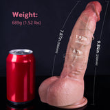 A flesh colored dildo and a red soda can on a black surface.