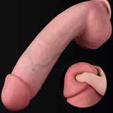 A hand is holding a flesh colored dildo with a black background.