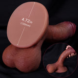 A dildo and hand holding a dildo base on a black background.