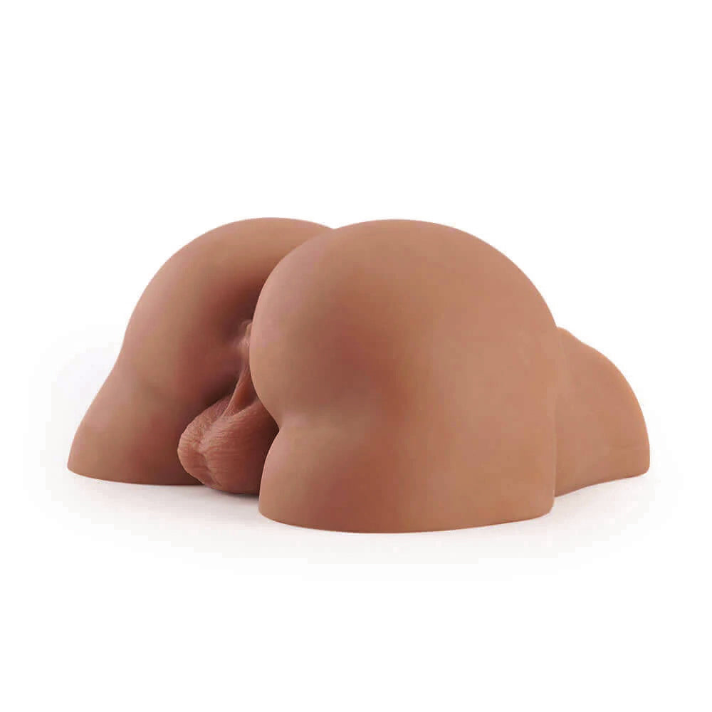 Four flesh colored silicone nipple covers are stacked on top of each other.