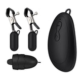 A black device with two clamps and a remote control.